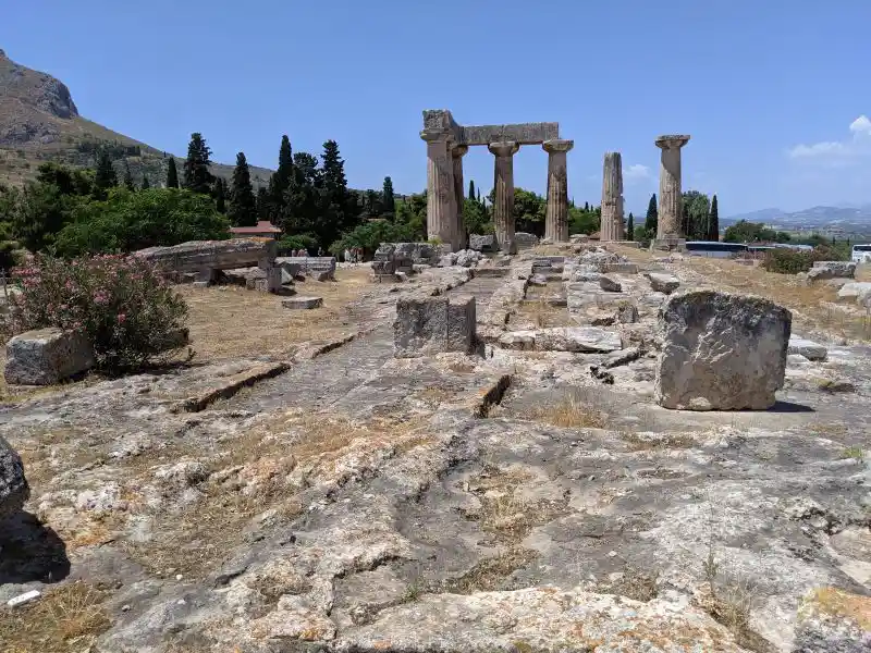 The archaic Temple of Apollo and surrounding archaeological ruins in Ancient Corinth